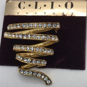 C.L.I.O Goldtone and Clear Rhinestone Whirl Brooch
